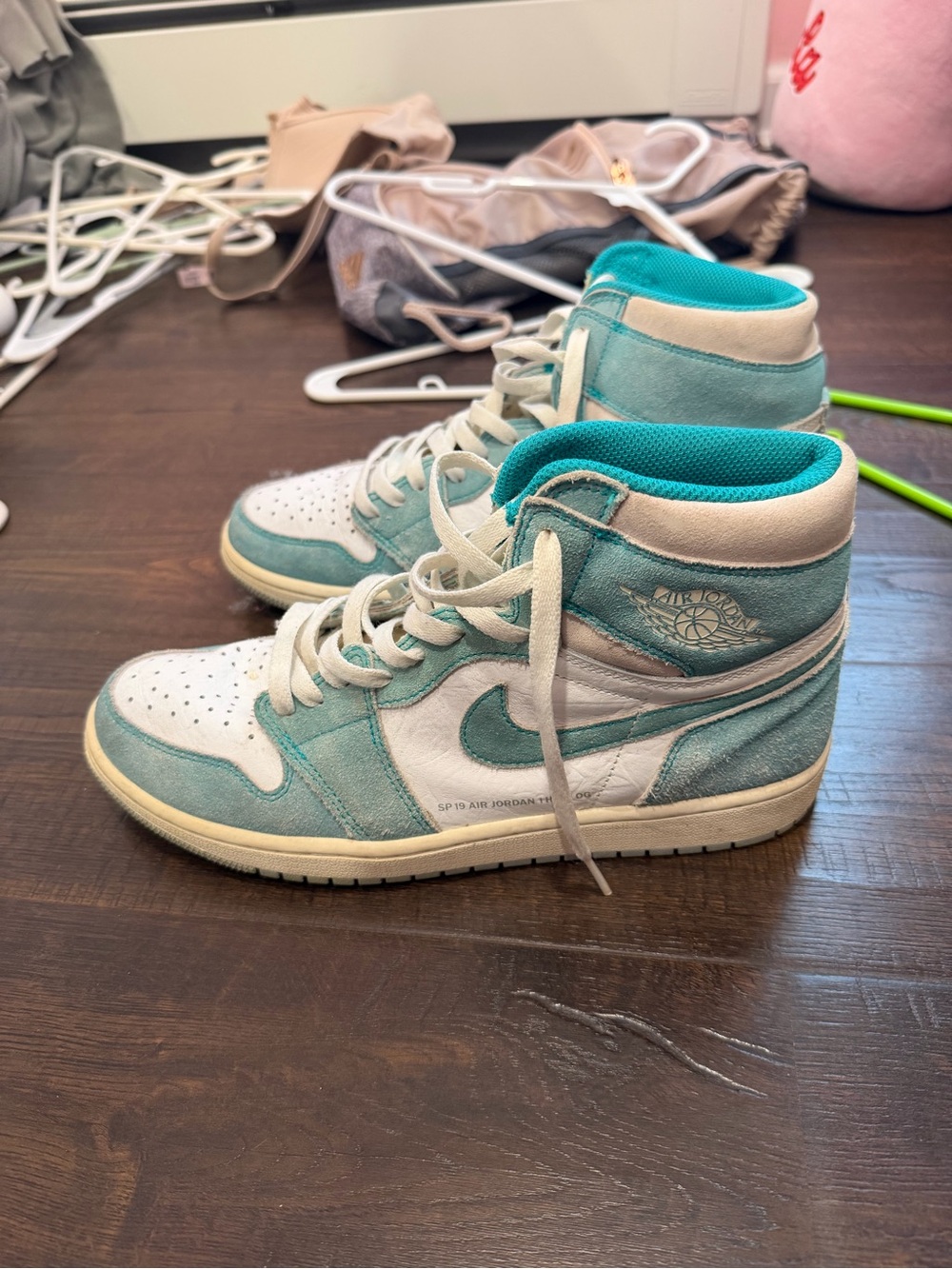 Nike Women’s Air Jordan 1 Mid Sneakers in Aqua Teal and White